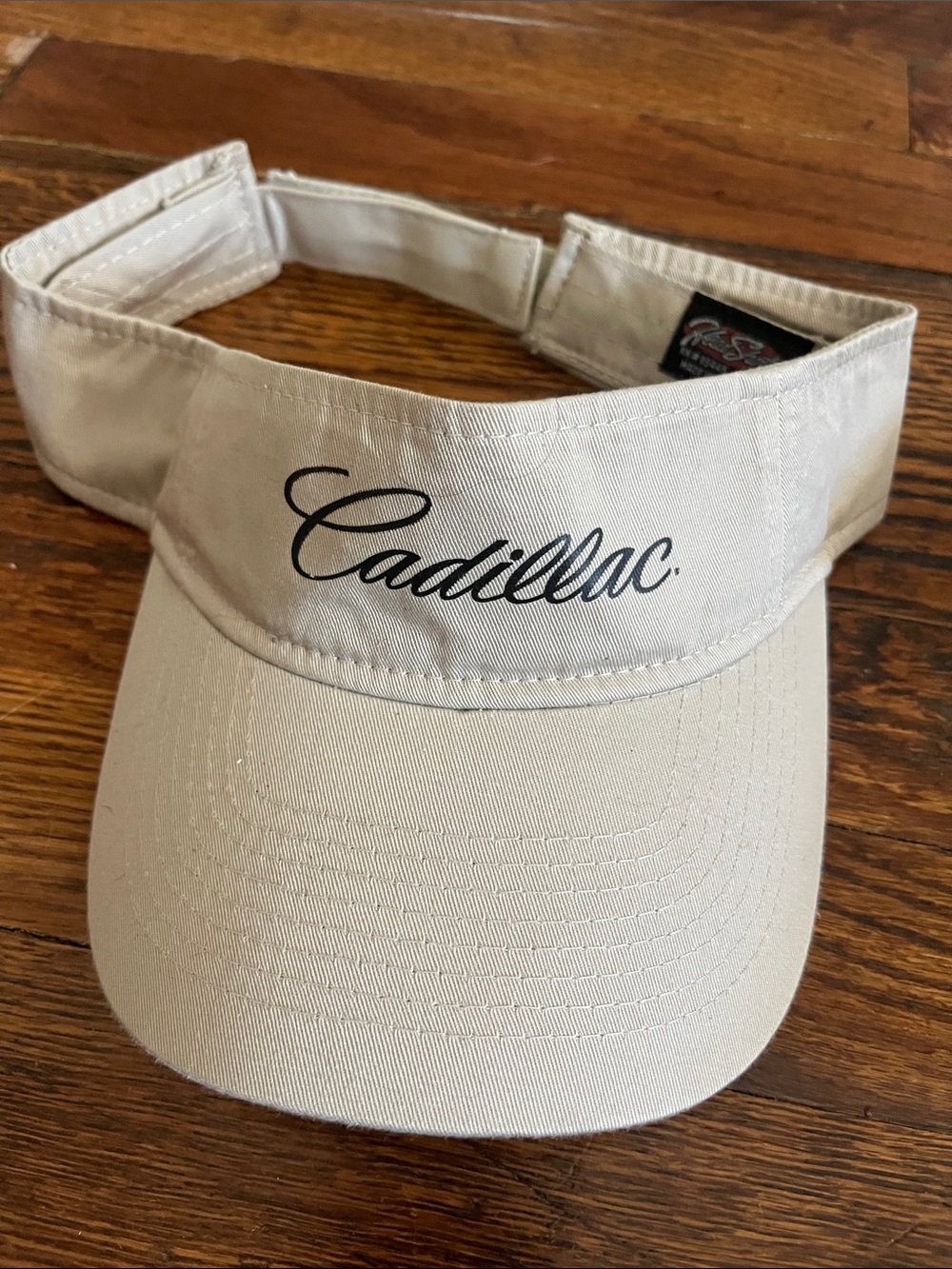 Tan Cadillac logo visor